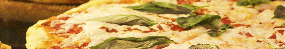 Eating Mediterranean Pizza at ZaZa Wood Fired Pizza &Mediterranean Cuisine restaurant in Toledo, OH.